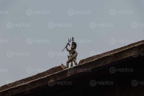 Find  the Image statue,roof-top,patan,durbar,square,world,hritage,site,declared,unesco  and other Royalty Free Stock Images of Nepal in the Neptos collection.