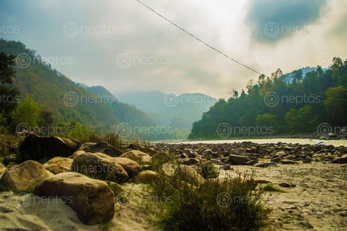 Find  the Image gorkha,beach,overlooking,trishuli,river  and other Royalty Free Stock Images of Nepal in the Neptos collection.