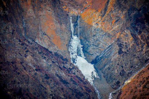 Find  the Image water,fall,frozen,cold,season,manang,nepal  and other Royalty Free Stock Images of Nepal in the Neptos collection.