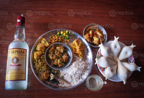 Find  the Image khaja,set,including,yomari,typically,newari,alcohol  and other Royalty Free Stock Images of Nepal in the Neptos collection.