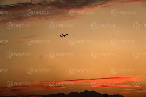 Find  the Image aeroplane,beautiful,invention,science,flies,region,sunset,majestic,evening  and other Royalty Free Stock Images of Nepal in the Neptos collection.