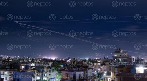 Find  the Image long,exposure,stacked,reveal,flight,path,airlines,takeoff,runway,tribhuvan,internation,airport  and other Royalty Free Stock Images of Nepal in the Neptos collection.