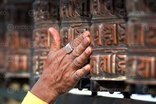 Find  the Image prayer,wheel,cylindrical,spindle,made,metal,wood,stone,leather,coarse,cotton,traditionally,mantra,written,newari,language,nepal,om,mani,padme,hum,commonly  and other Royalty Free Stock Images of Nepal in the Neptos collection.