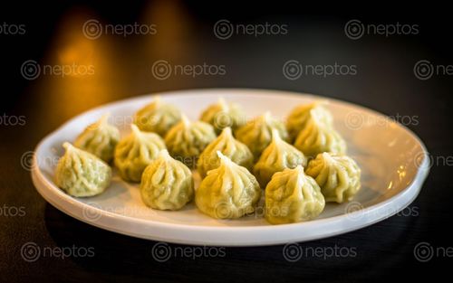 Find  the Image famous,delicious,fastfood,steem,momo,kathmandu,nepal  and other Royalty Free Stock Images of Nepal in the Neptos collection.