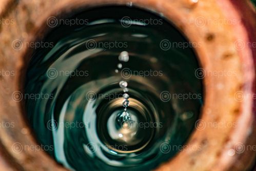 Find  the Image water,gently,falling,clay,pot  and other Royalty Free Stock Images of Nepal in the Neptos collection.