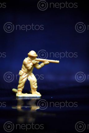 Find  the Image yellow,plastic,army,toy,sms,photography  and other Royalty Free Stock Images of Nepal in the Neptos collection.