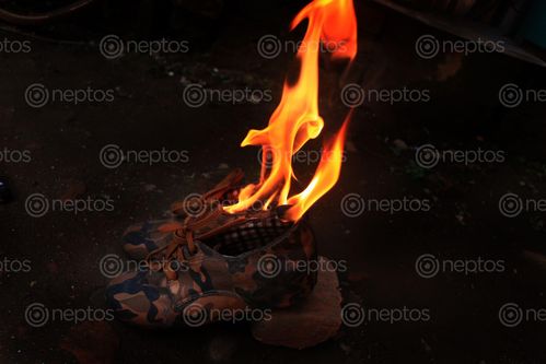 Find  the Image burning,shoes,sms,photography  and other Royalty Free Stock Images of Nepal in the Neptos collection.
