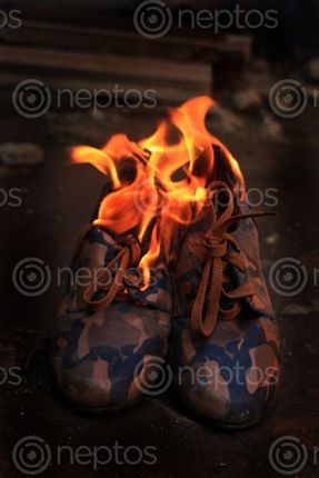 Find  the Image burning,shoes,sms,photography  and other Royalty Free Stock Images of Nepal in the Neptos collection.