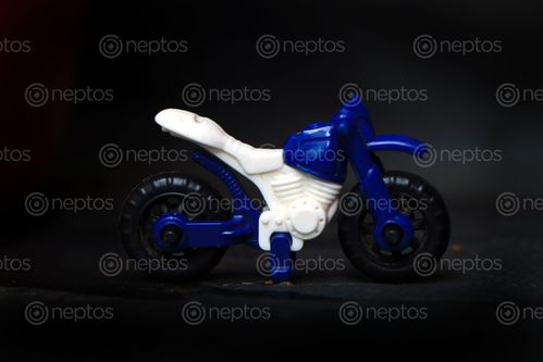 Find  the Image bike,toy,kids,sms,photography  and other Royalty Free Stock Images of Nepal in the Neptos collection.