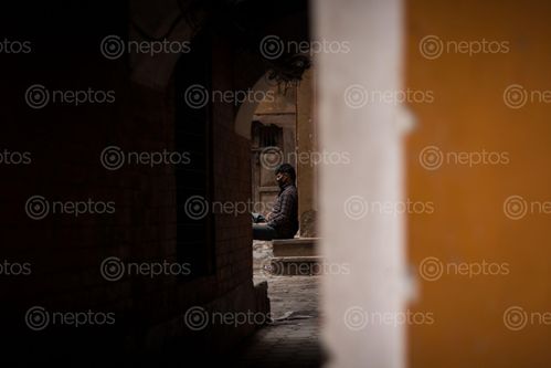 Find  the Image man,wearing,mask,sitting,complete,isolation,city,suffers,month,long,lockdown,due,widespread,corona,virus  and other Royalty Free Stock Images of Nepal in the Neptos collection.