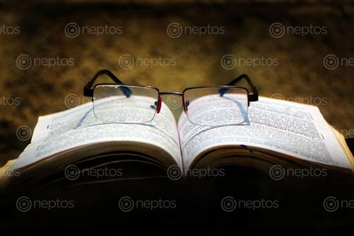 Find  the Image opened,book,glasses#,sms,photography  and other Royalty Free Stock Images of Nepal in the Neptos collection.