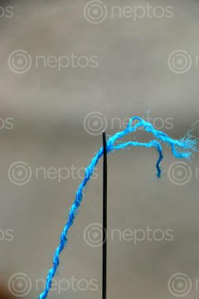 Find  the Image needle,thread,picture#,sms,photography  and other Royalty Free Stock Images of Nepal in the Neptos collection.
