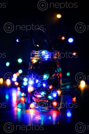 Find  the Image christmas,lights,glass,bottle,black,background,sita,maya,shrestha  and other Royalty Free Stock Images of Nepal in the Neptos collection.