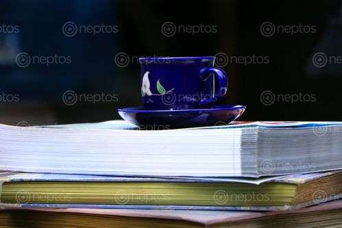 Find  the Image tea#,blue,cup,plate#,book,image,sita,maya,shrestha  and other Royalty Free Stock Images of Nepal in the Neptos collection.