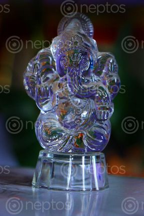 Find  the Image glass,ganesh#,god,image,sita,maya,shrestha  and other Royalty Free Stock Images of Nepal in the Neptos collection.