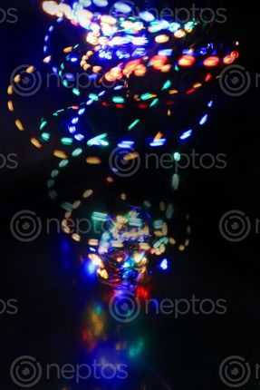 Find  the Image christmas,lights,spiral,background  and other Royalty Free Stock Images of Nepal in the Neptos collection.