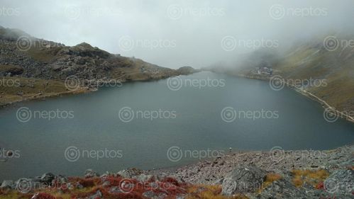 Find  the Image beautiful,gosaikunda,lake,covered,cloud  and other Royalty Free Stock Images of Nepal in the Neptos collection.