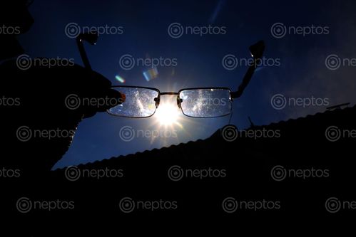 Find  the Image hand,hold,glasses,sky,sunlight,photography,sita,maya,shrestha  and other Royalty Free Stock Images of Nepal in the Neptos collection.