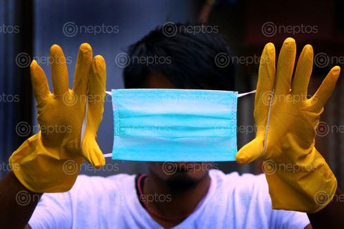 Find  the Image wearing,masks,gloves,protect,coronavirus/,photography,sita,maya,shrestha  and other Royalty Free Stock Images of Nepal in the Neptos collection.