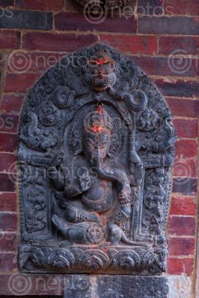 Find  the Image lord,ganesh,statue,wall,patan,durbar,square,nepal  and other Royalty Free Stock Images of Nepal in the Neptos collection.