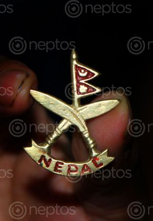Find  the Image lapel,pin,nepali,khukuri,cross,nepal,national,flag,stock,photography,sita,maya,shrestha  and other Royalty Free Stock Images of Nepal in the Neptos collection.