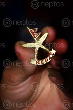 Find  the Image lapel,pin,nepali,khukuri,cross,nepal,national,flag,stock,photography,sita,maya,shrestha  and other Royalty Free Stock Images of Nepal in the Neptos collection.