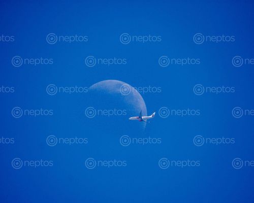 Find  the Image clicked,gumba,danda,hetauda,nepal,capturing,moon,coincidence,airplane,flying,infront,quickly,captured,thought,cool,fly,show,white  and other Royalty Free Stock Images of Nepal in the Neptos collection.