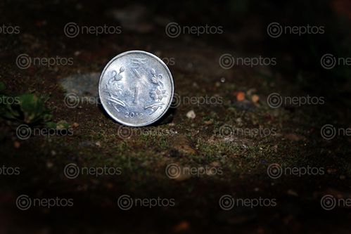 Find  the Image coin,india,image,photography,sita,maya,shrestha  and other Royalty Free Stock Images of Nepal in the Neptos collection.