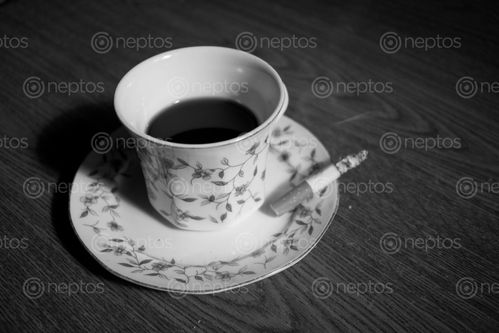 Find  the Image combo,cigarette,cup,hard,coffee  and other Royalty Free Stock Images of Nepal in the Neptos collection.