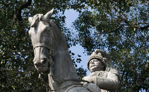 Find  the Image statue,prithvi,bir,bikram,shah,bhadrakali,sculpted,england,bs,statues,kings,dynasty,riding,horse  and other Royalty Free Stock Images of Nepal in the Neptos collection.