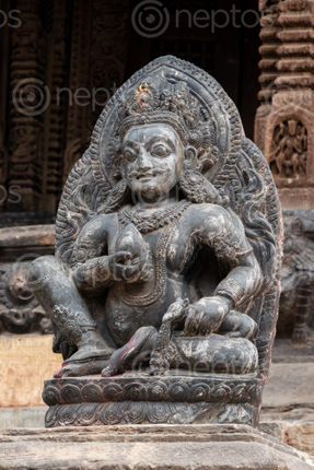 Find  the Image statue,god,temple,patan,durbar,square  and other Royalty Free Stock Images of Nepal in the Neptos collection.