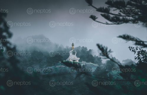 Find  the Image jamchen,vijaya,stupa,foggy,day  and other Royalty Free Stock Images of Nepal in the Neptos collection.