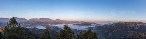 Find  the Image panorama,view,clouds,hills,mountains,namobuddha,sunrise  and other Royalty Free Stock Images of Nepal in the Neptos collection.
