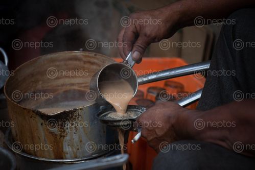 Find  the Image man,pours,glass,nepali,tea,morning,asan,kathmandu  and other Royalty Free Stock Images of Nepal in the Neptos collection.