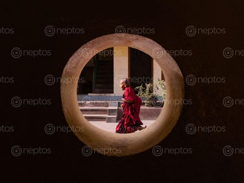 Find  the Image young,monk,runs,freely,pictured,small,hole,wall  and other Royalty Free Stock Images of Nepal in the Neptos collection.