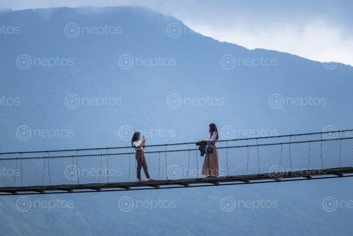 Find  the Image girls,pictures,bridge,kirtipur,nepal  and other Royalty Free Stock Images of Nepal in the Neptos collection.