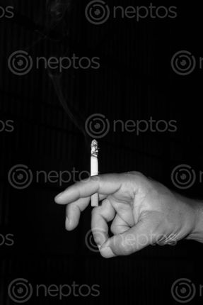 Find  the Image men,smoking,cigarette,stock,image#,nepal_photography,sita,maya,shrestha  and other Royalty Free Stock Images of Nepal in the Neptos collection.