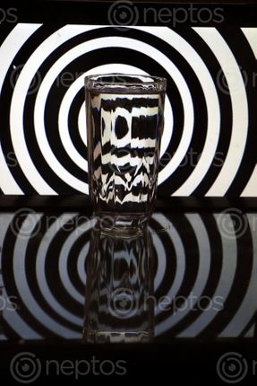 Find  the Image refraction,black,white#,stock,image,nepal,photographyby,sita,maya,shrestha  and other Royalty Free Stock Images of Nepal in the Neptos collection.