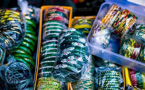 Find  the Image collection,green,yellow,churabangles,patan,nepal  and other Royalty Free Stock Images of Nepal in the Neptos collection.