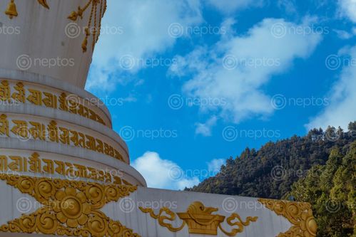 Find  the Image view,clear,sky,trees,stupa,located,budhanilkantha,nepal  and other Royalty Free Stock Images of Nepal in the Neptos collection.