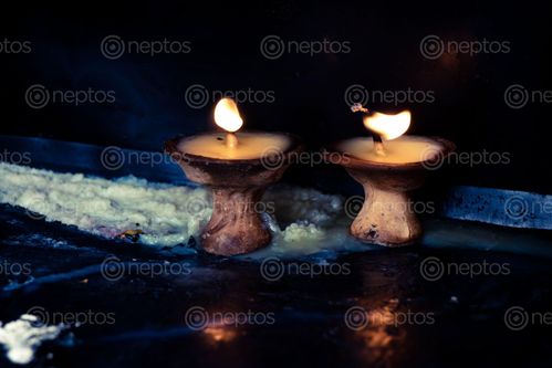 Find  the Image prayer,candlediyo,lit,devotees,temple,stupas,churches,worshipping,god  and other Royalty Free Stock Images of Nepal in the Neptos collection.