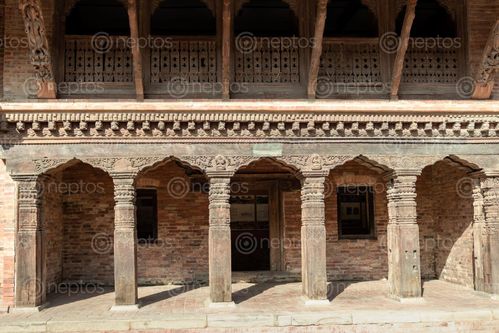 Find  the Image wood,carving,details,doors,windows,patan,durbar,square,nepal,world,heritage,site,declared,unesco  and other Royalty Free Stock Images of Nepal in the Neptos collection.