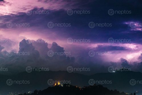 Find  the Image lightning,clouds,swoyambhunath,chandragiri,hilla  and other Royalty Free Stock Images of Nepal in the Neptos collection.