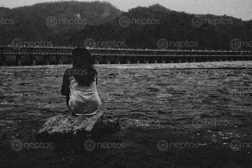Find  the Image picture,girl,sitting,stone,bank,bagmati,river  and other Royalty Free Stock Images of Nepal in the Neptos collection.