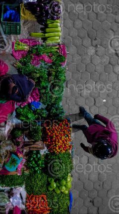 Find  the Image woman,selling,vegetables,night,baneshwor,area  and other Royalty Free Stock Images of Nepal in the Neptos collection.