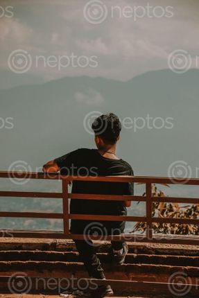 Find  the Image guy,watching,view,uma,maheshwor,temple  and other Royalty Free Stock Images of Nepal in the Neptos collection.