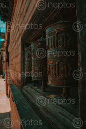 Find  the Image copper,prayer,wheel,frame  and other Royalty Free Stock Images of Nepal in the Neptos collection.