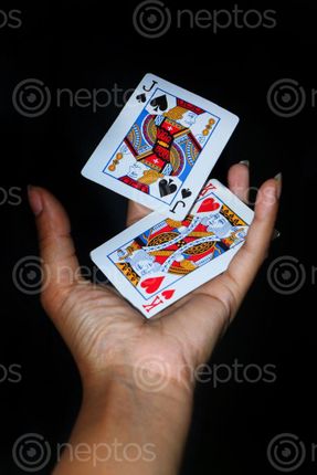 Find  the Image holding,play,cards#,stock,image,nepalphotography,sita,maya,shrestha  and other Royalty Free Stock Images of Nepal in the Neptos collection.
