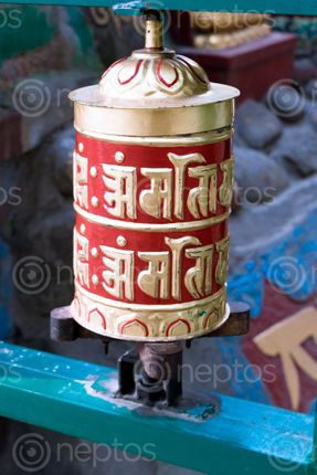 Find  the Image prayer,wheels,spinned,devotees,aid,meditation,accumulating,wisdom,good,karma,putting,negative,energy  and other Royalty Free Stock Images of Nepal in the Neptos collection.
