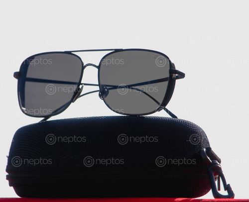 Find  the Image sunglass,man,stylish  and other Royalty Free Stock Images of Nepal in the Neptos collection.